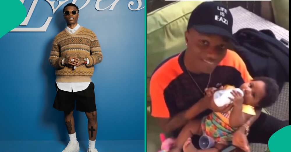 Video of Wizkid bottle feeding his son, AJ goes viral