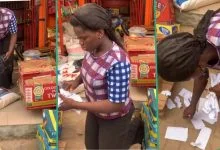 Sales girl weeps as N120k from customer who took bags of rice 'turns to papers'
