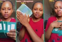 Nigerian Lady Emotional after Her Canadian Visa Got Approved, Flaunts Her Passport in Tears