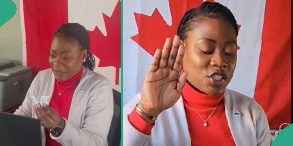 Lady in Canada cuts old residence card with scissors after becoming a citizen