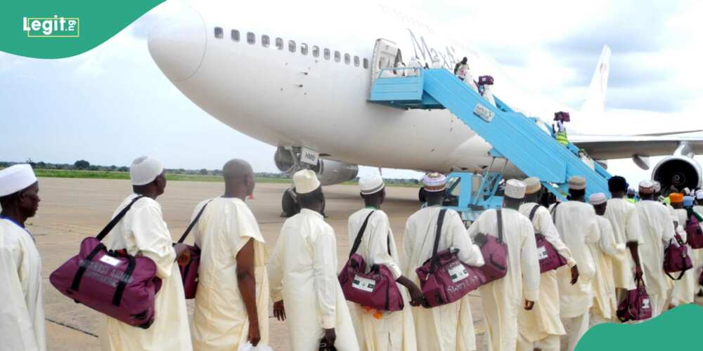 Pilgrims queue to board airplane to Saudi Arabia