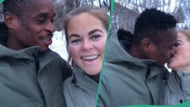 Nigerian man and his Oyinbo wife share romantic moment in snow after he praises...