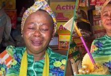 Young Man Gives Mother Heartfelt Birthday Celebration at Her Shop, Sprays Naira Notes