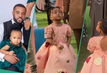 See how Williams Uchemba's lil daughter joins Igbo traditional music group and masquerade to entertain guests at a wedding (video)