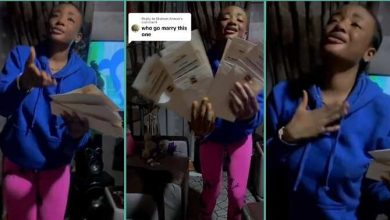 Watch emotional video as lady flaunts wedding card after she was told that she would never get married