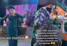 See how a German lady wore a stylish traditional outfit and was sprayed money at a wedding (video)