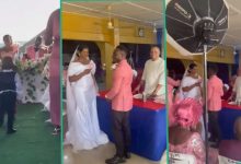 Video emerges as Nigerian couple do wedding in corner of church hall, hold reception in car park