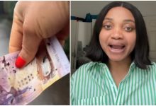 "Should I Take it to the Police?" Nigerian Lady Asks as She Picks Pounds on Road in UK, Shares Video