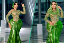 Lady With Massive Curves Slays In Gorgeous Green Dress, Gets Mixed Reactions: "It Looks Ridiculous"