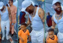 "Shake Hands With Davido": Boy Leaves Crowd in Awe As He Goes Down on His Kneels to Greet OBO