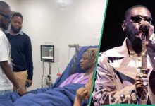 Adekunle Gold Visits Khaid in Hospital Hours After Touching Down Nigeria: "Wetin Happen to Him?"