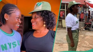 Young Lady Salutes Mother in Her NYSC Uniform to Appreciate Her Support