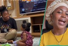 Young Nigerian Mother Makes Her Little Kid Happy with Her Bedtime Stories